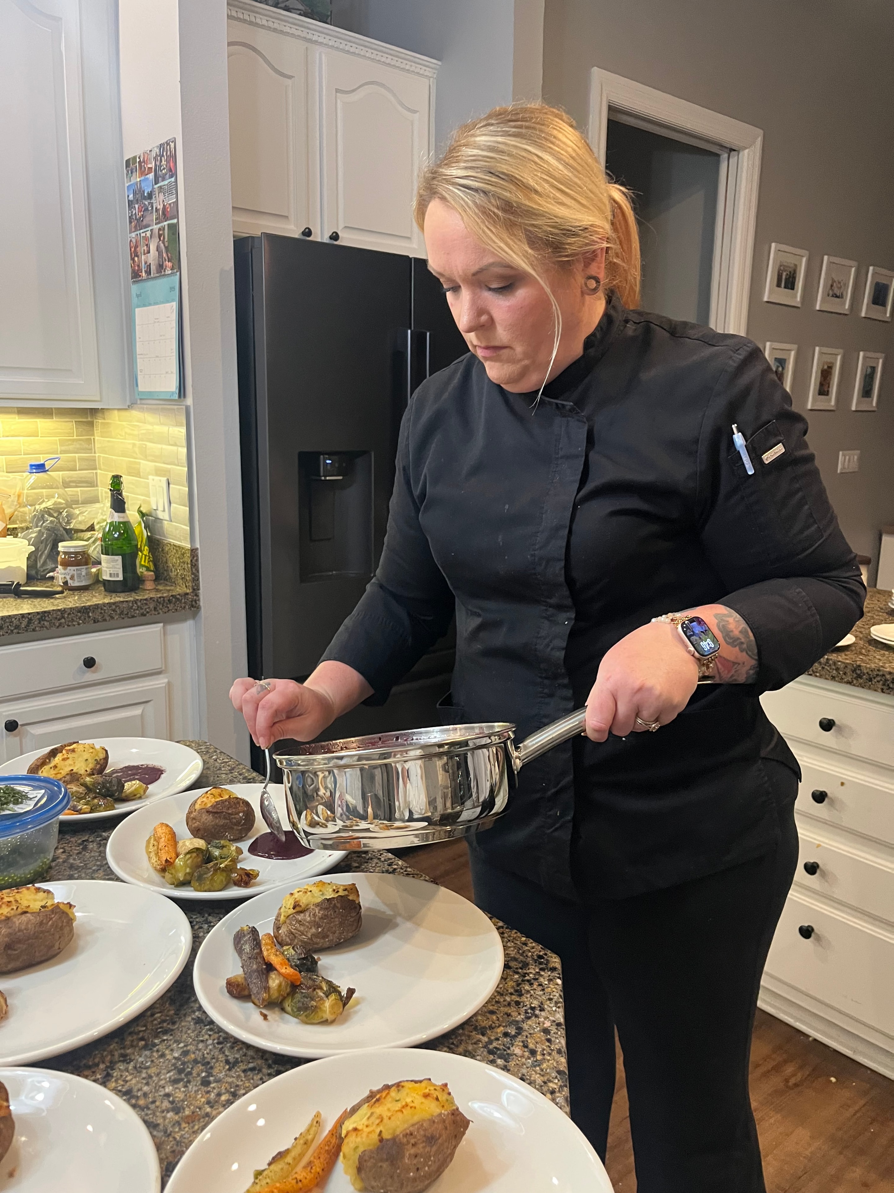 Chef Brandi Smith preparing a private dining experience in a Tampa Bay home